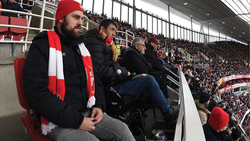 Fans watching in the disabled supporters section