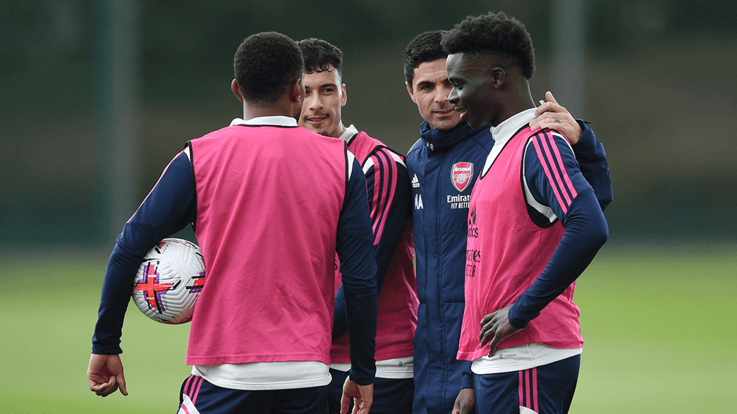 Mikel Arteta, Bukayo Saka and Gabriel Martinelli in training